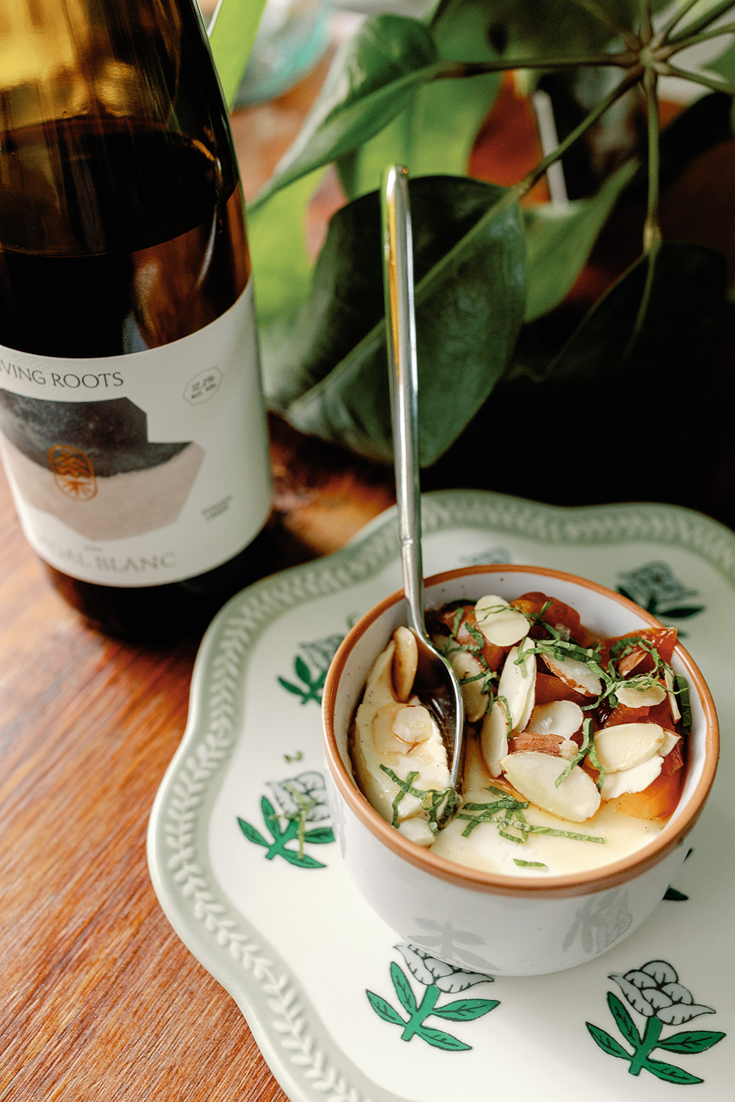 Yogurt honey panna cotta with stewed peach, toasted almond